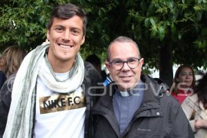Mantovani y Pablo Fdez, párroco